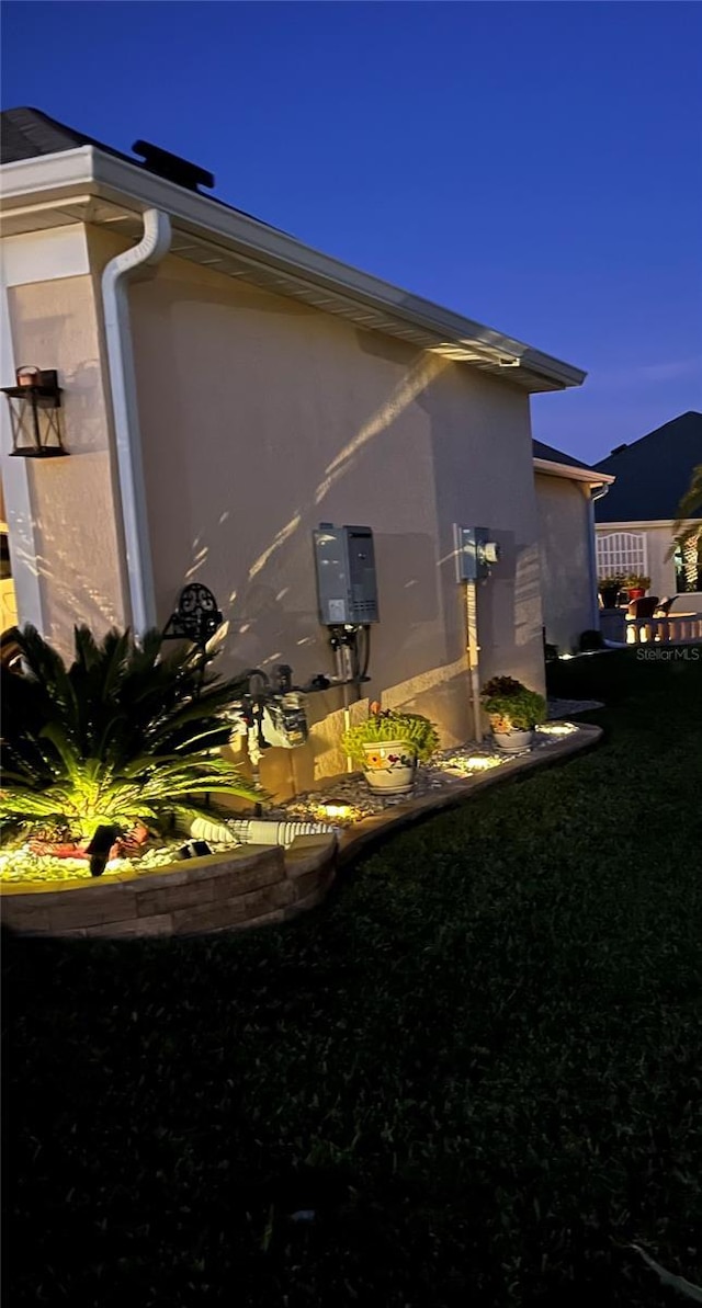 5857 Mackenzie Ave, The Villages, FL 32163 - view of property exterior with stucco siding