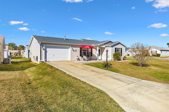 single story home featuring a garage, a front yard, and central AC unit