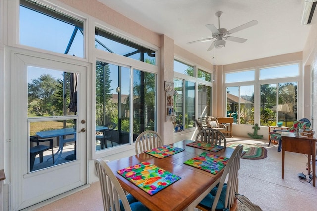 sunroom with ceiling fan and a healthy amount of sunlight