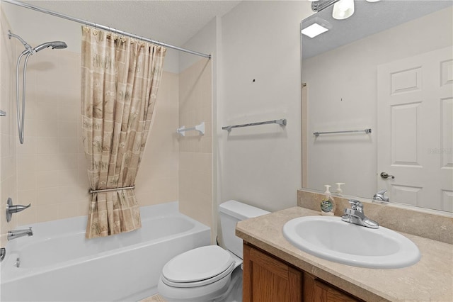 full bathroom with vanity, shower / tub combo with curtain, a textured ceiling, and toilet