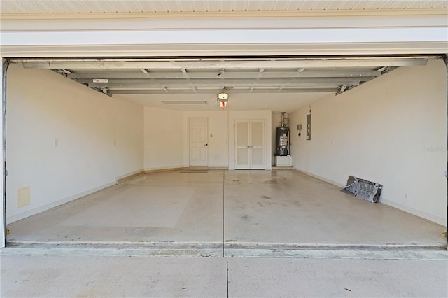 garage with a garage door opener, gas water heater, and electric panel