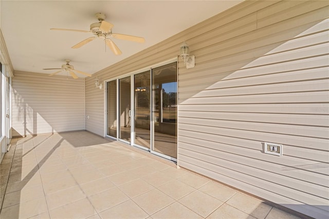 view of patio featuring ceiling fan