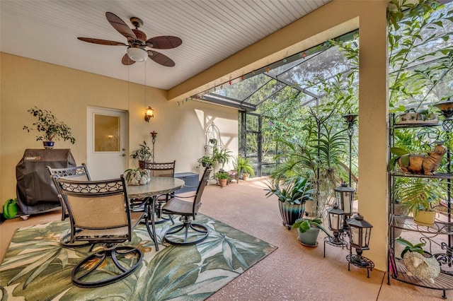 sunroom / solarium with ceiling fan