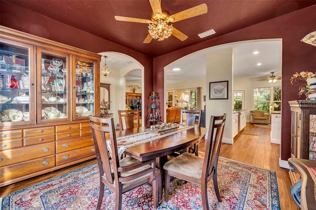 dining room featuring ceiling fan and light wood-type flooring