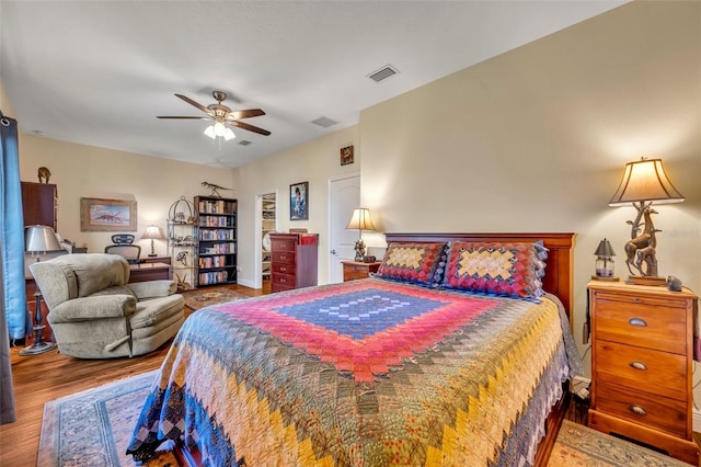 bedroom featuring ceiling fan and hardwood / wood-style floors