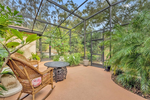 view of patio / terrace with glass enclosure