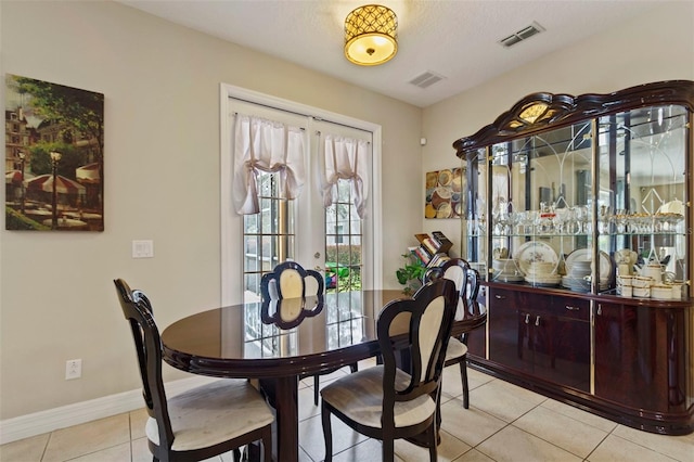 dining room with light tile patterned floors