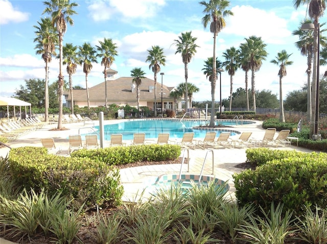 view of swimming pool with a patio area