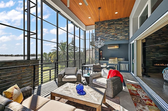 view of patio / terrace with a wall mounted AC, an outdoor living space, a grill, and area for grilling