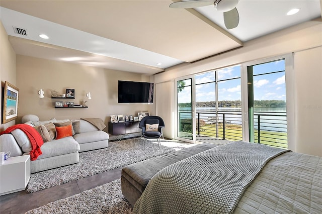 bedroom with ceiling fan, access to outside, and concrete flooring