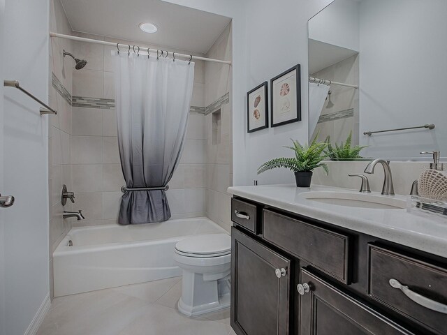 full bathroom featuring toilet, vanity, shower / bath combo, and tile patterned flooring