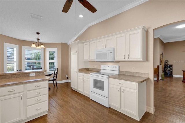 kitchen with white cabinetry, hardwood / wood-style flooring, decorative light fixtures, white appliances, and ceiling fan with notable chandelier