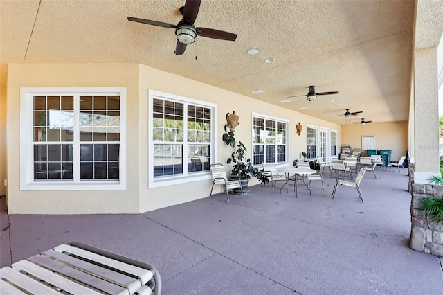 view of patio with ceiling fan