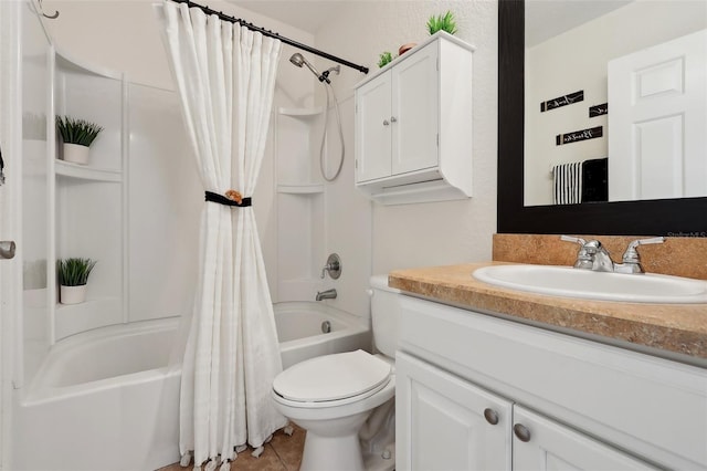 full bathroom featuring vanity, shower / tub combo, tile patterned floors, and toilet