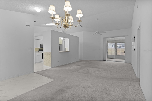 unfurnished room featuring vaulted ceiling, ceiling fan with notable chandelier, light carpet, and a textured ceiling