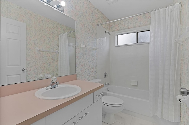 full bathroom featuring vanity, tile patterned floors, toilet, and shower / bath combo