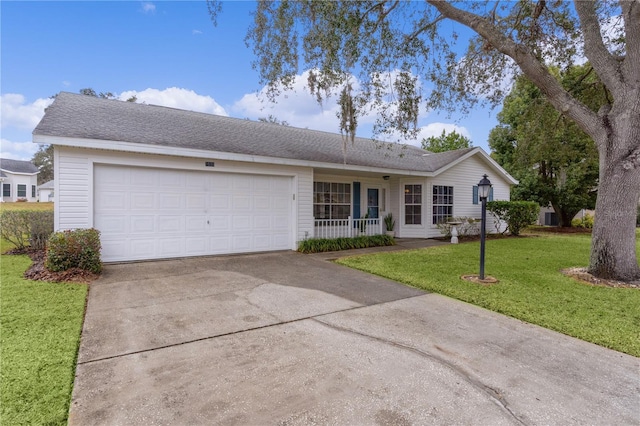 ranch-style house featuring a porch, a garage, and a front lawn