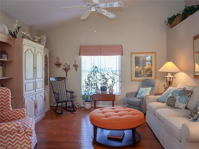 living room featuring a ceiling fan, lofted ceiling, and wood finished floors