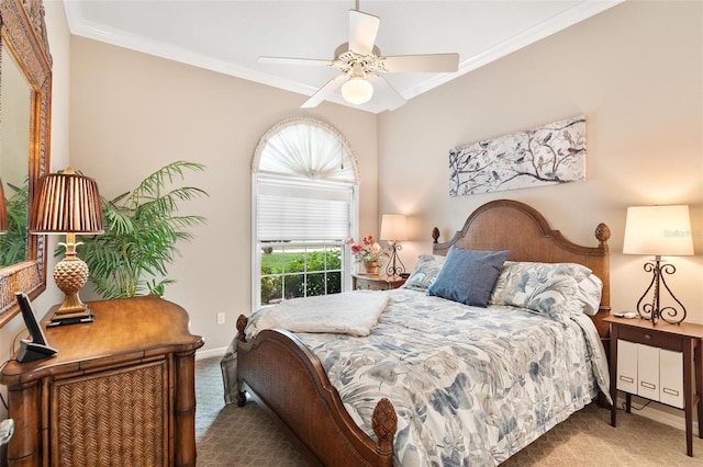 bedroom featuring crown molding, carpet, and ceiling fan