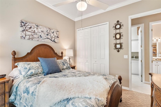 bedroom with ceiling fan, connected bathroom, ornamental molding, light colored carpet, and a closet