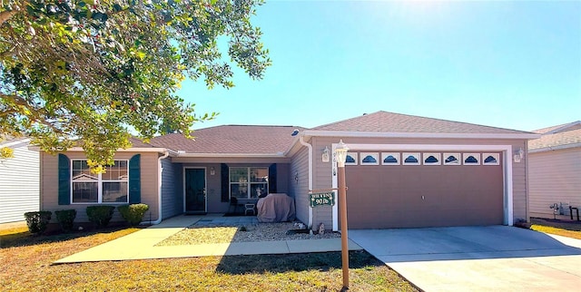 ranch-style house with a garage