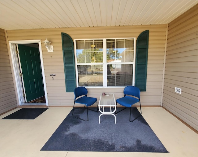 view of patio featuring a porch