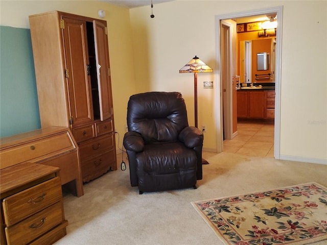 sitting room with light colored carpet