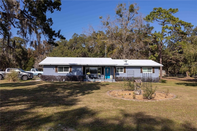 view of front of home with a front yard