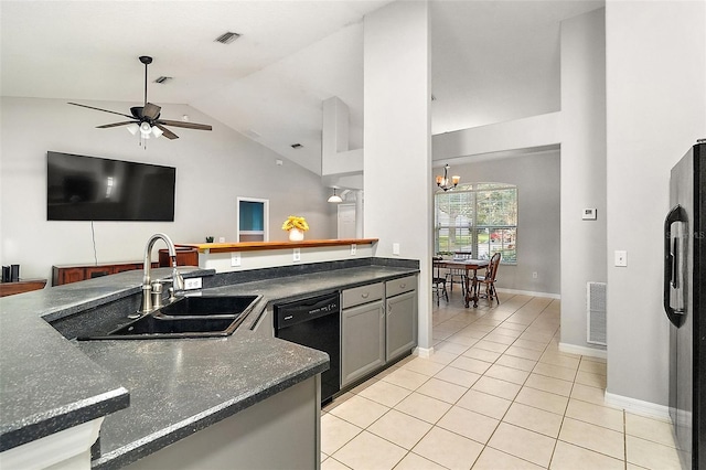 kitchen featuring ceiling fan with notable chandelier, black appliances, sink, light tile patterned flooring, and gray cabinetry