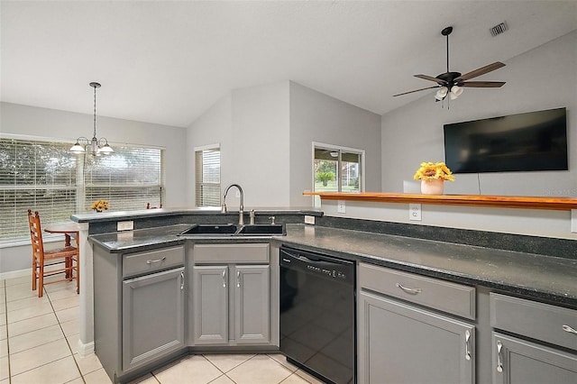 kitchen featuring vaulted ceiling, dishwasher, sink, gray cabinets, and light tile patterned flooring