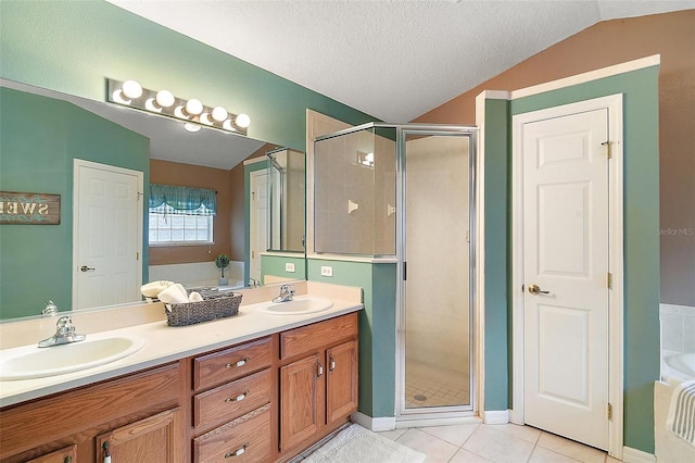 bathroom featuring shower with separate bathtub, a textured ceiling, tile patterned floors, vanity, and lofted ceiling