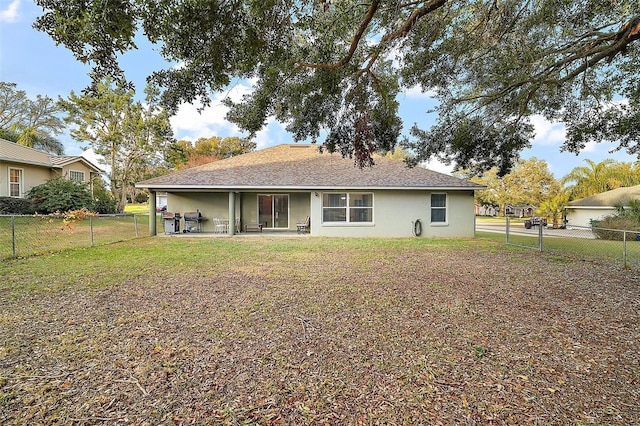 back of house featuring a patio