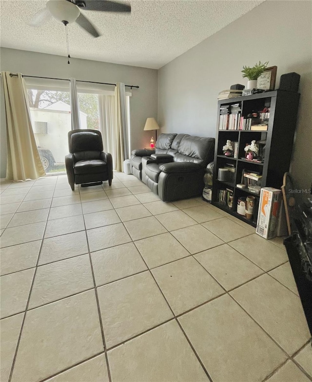 interior space featuring a textured ceiling and ceiling fan