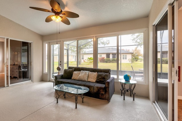 sunroom with vaulted ceiling and ceiling fan