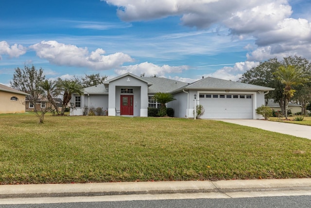 view of front facade with a garage and a front yard