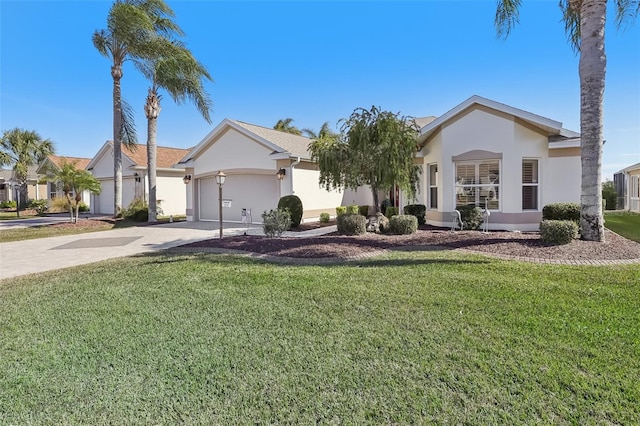 ranch-style home featuring a garage and a front lawn