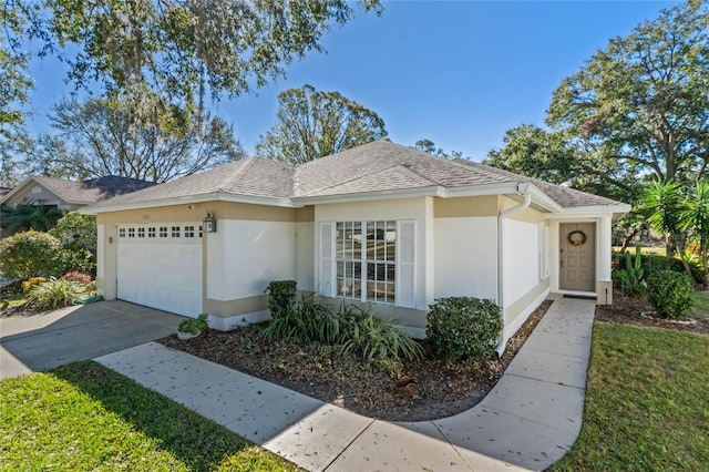 ranch-style home featuring a garage