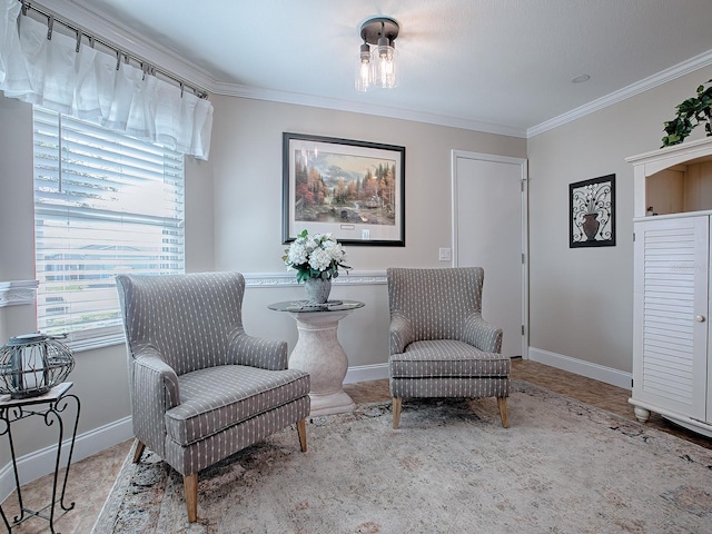 sitting room with ornamental molding