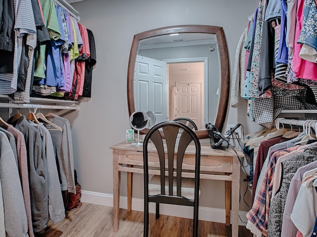 walk in closet featuring light wood-type flooring