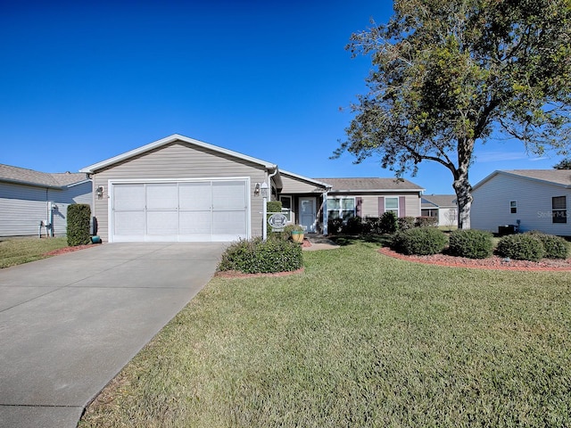 single story home featuring a front yard and a garage