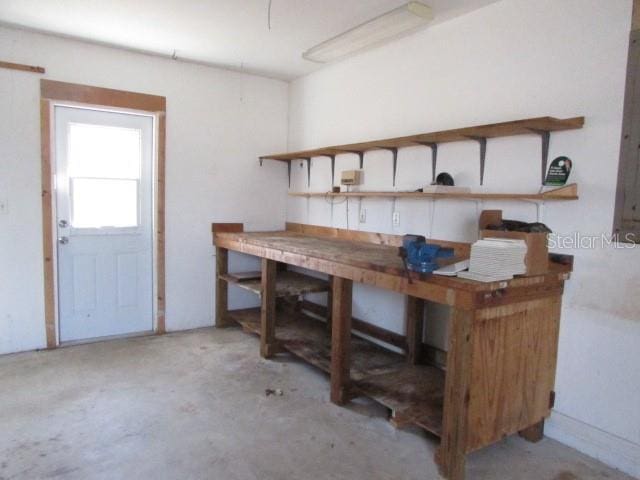 basement with a workshop area