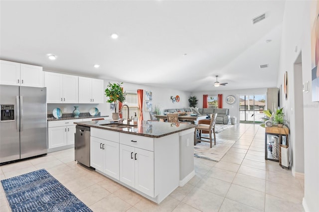 13557 Willow Bluestar Loop, Riverview, FL 33579 - kitchen featuring light tile patterned floors, a sink, visible vents, a ceiling fan, and appliances with stainless steel finishes