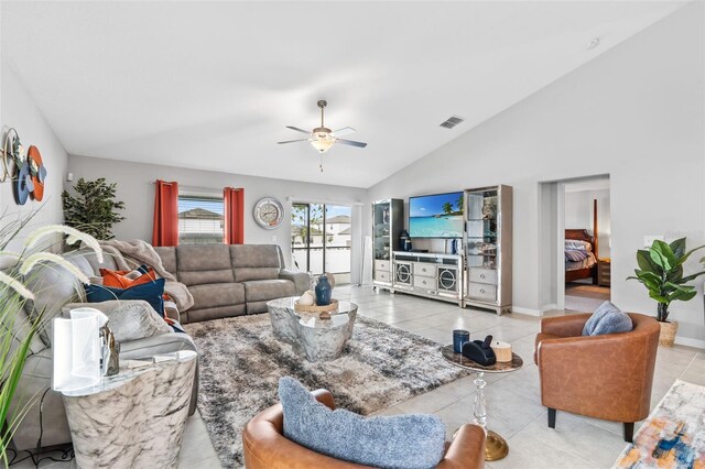 13557 Willow Bluestar Loop, Riverview, FL 33579 - living area featuring tile patterned floors, visible vents, vaulted ceiling, and a ceiling fan