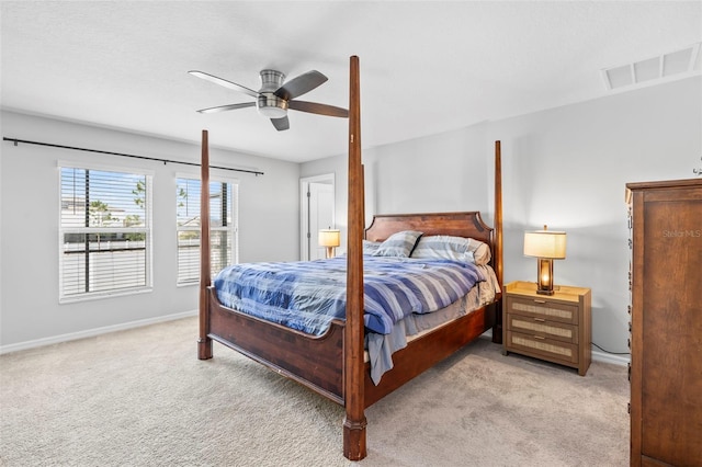 13557 Willow Bluestar Loop, Riverview, FL 33579 - bedroom with a ceiling fan, light carpet, baseboards, and visible vents