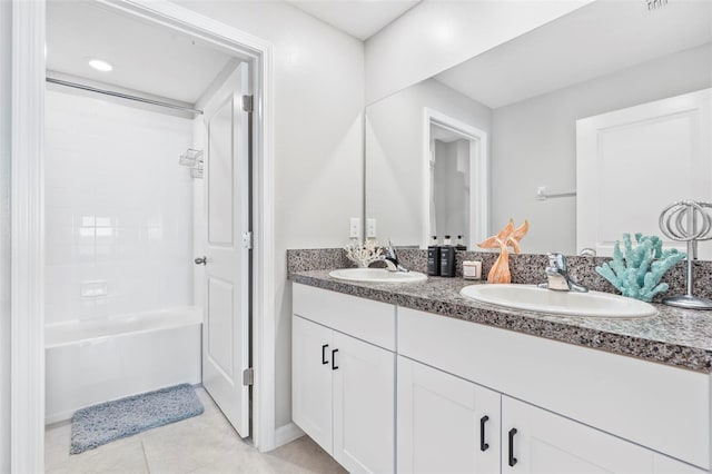 13557 Willow Bluestar Loop, Riverview, FL 33579 - full bathroom featuring  shower combination, double vanity, a sink, and tile patterned flooring