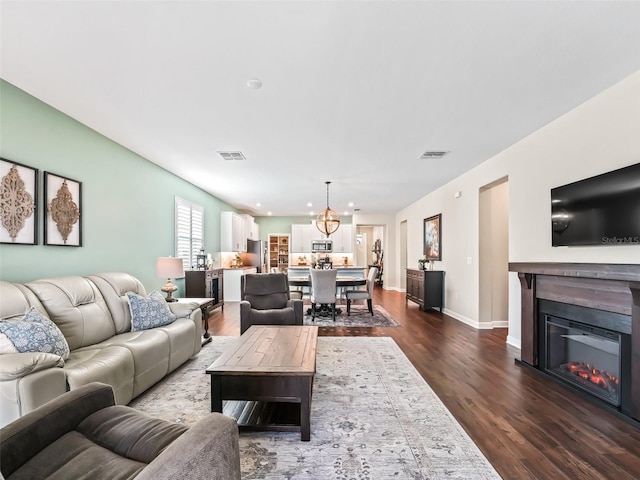 living room with dark wood-type flooring