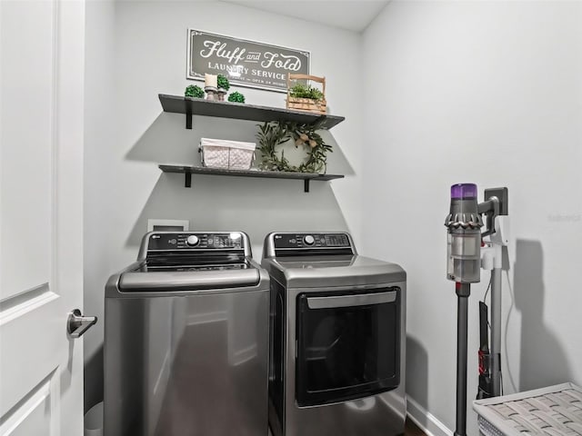 washroom with washer and dryer