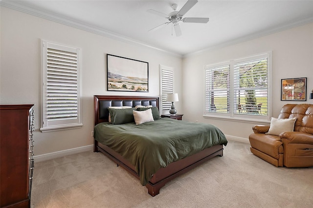 bedroom featuring light carpet, ceiling fan, and ornamental molding