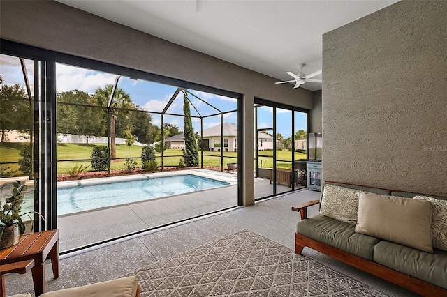 view of pool featuring ceiling fan