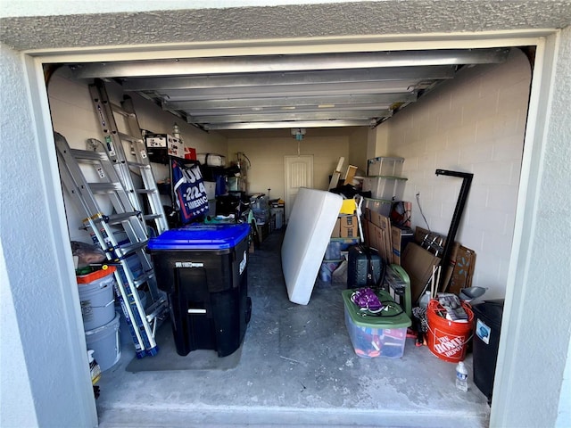 garage featuring concrete block wall